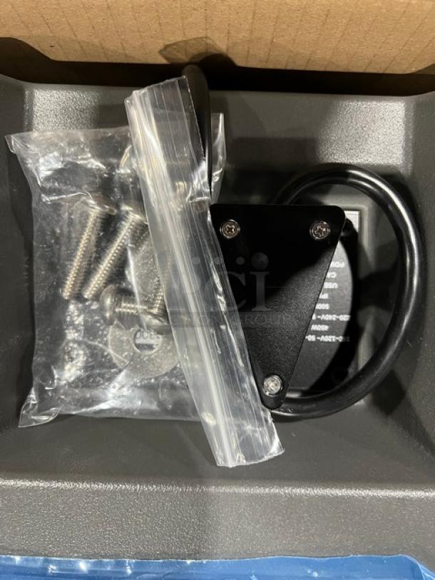 Brand new Cambro Pro Cart Ultra Series hot module, model PCMHX615, shown with enclosed screws and power cable, 115V.