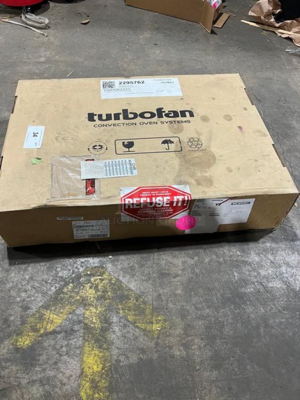 Brand new Moffat Turbofan E22/E23 Double Stacking Kit, Model DSK2223, SN: 2295762, in sealed box on a warehouse floor.