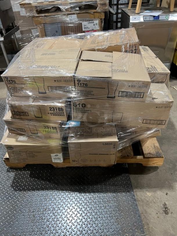 Mixed pallet with boxed glassware from Libbey and Chef & Sommelier, including models 8883, 610, 1176, 23186, 2486, and L5635. Brand new.