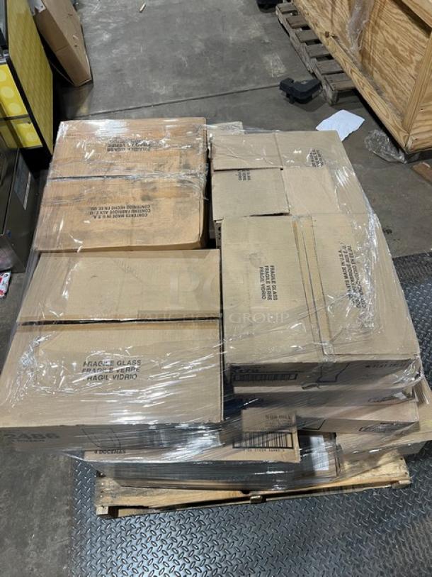 Mixed pallet of brand new glassware, including Libbey Omega Martini Glasses, Nob Hill Hi-Ball Glasses, and more, wrapped in plastic.