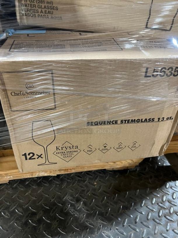 Mixed pallet of glassware including Chef & Sommelier Krysta 13 oz wine glasses, 12 per case, Model L5635, in original packaging.