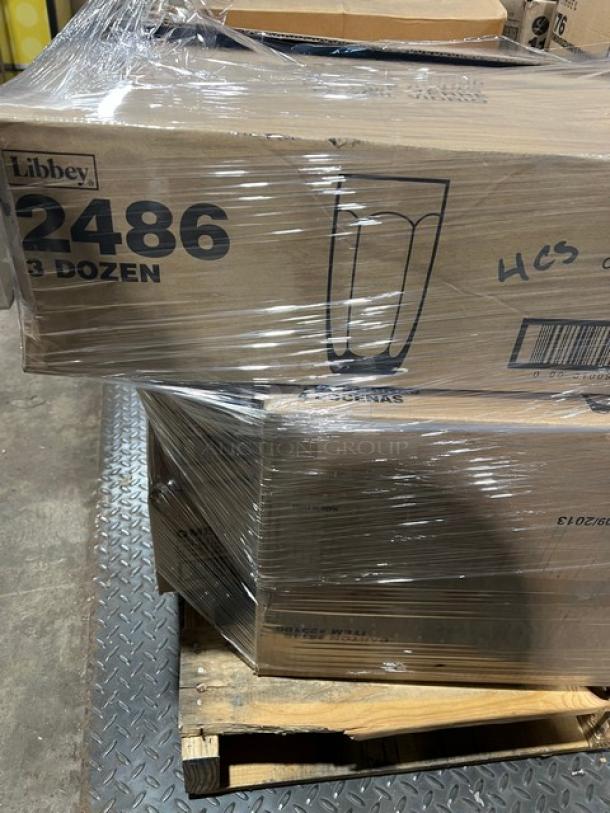 Mixed pallet of new Libbey glassware, includes various collections and models, wrapped in plastic, on a wooden pallet.