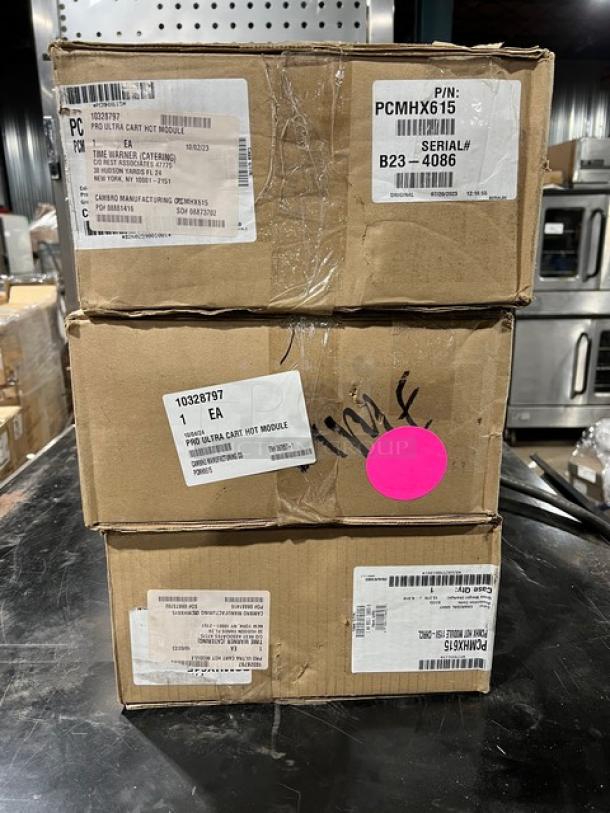Brand new Cambro Pro Cart Ultra Series electric hot module in box. Model PCMHX615, 115V, adjustable temperature, charcoal gray.