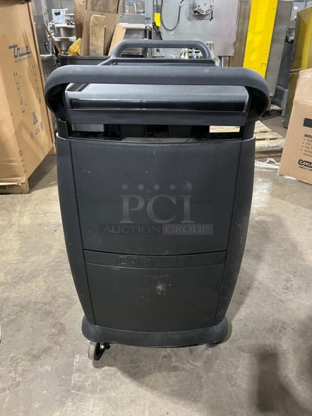 Carlisle 3-tier utility cart, black, scratch-n-dent condition, on casters, commercial use, durable plastic material.