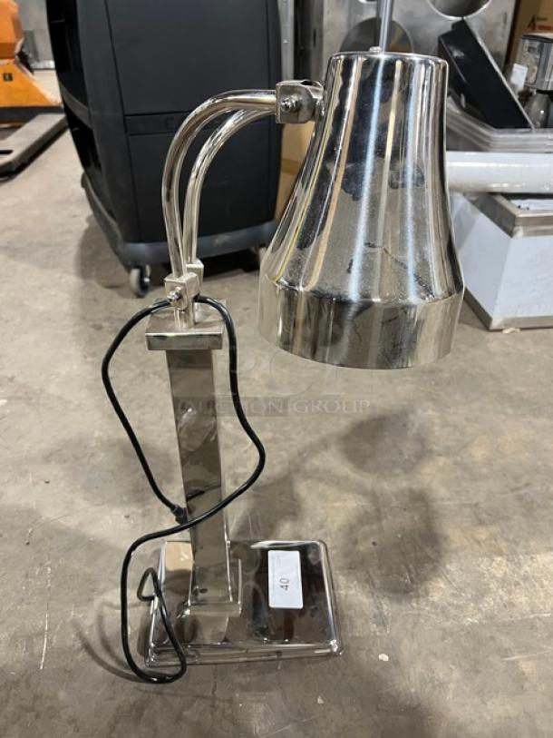 New commercial stainless steel double-head heat lamp, electric powered, with individual power control. Ideal for buffet or food warming.