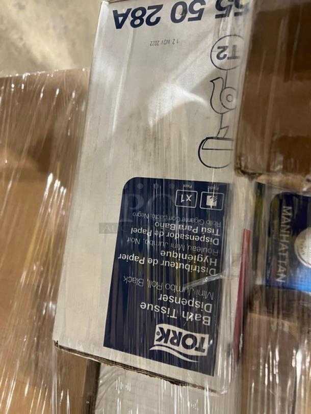 Mixed pallet with Tork toilet paper dispenser box. Includes various commercial kitchenware and supplies. Brand new condition.