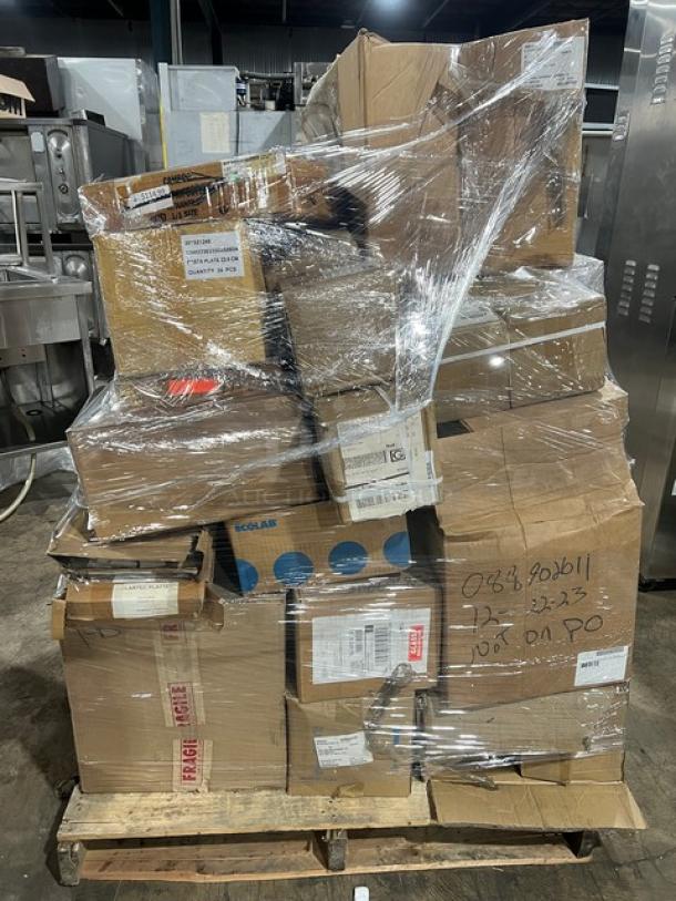 Mixed pallet of brand new commercial kitchenware items, shrink-wrapped on a wooden pallet. Visible labels include shipping details and handling instructions.