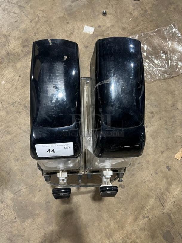 NEW Vollrath CBE127 dual 3.2-gal Icee Slush dispenser, black, clear hoppers, electric, slight scratches, 115V, SN: I053-378109-302.