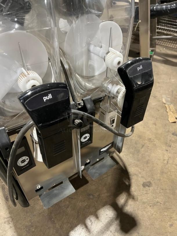 Vollrath Stoelting CBE127 dual 3.2 gal. dispensers, clear polycarbonate hoppers, black pull handles, electric, 115V.