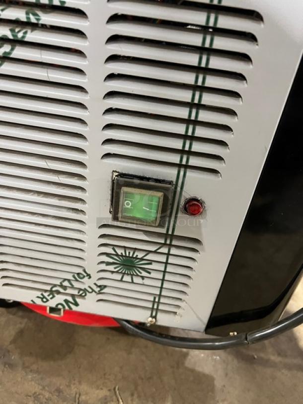 Vollrath Stoelting CBE127 Icee dispenser control panel, showing power switch and vent. Scratch on white surface.