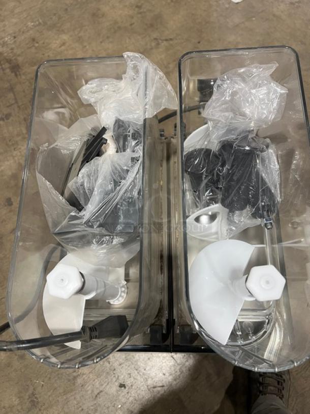 Vollrath Stoelting CBE127 dual 3.2 gal. slush dispenser, clear polycarbonate hoppers, new scratch-and-dent condition.