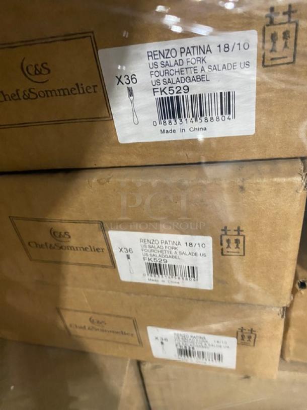 Stacked boxes of Chef & Sommelier Renzo Patina stainless steel salad forks, model FK529, 36 per case, new condition.