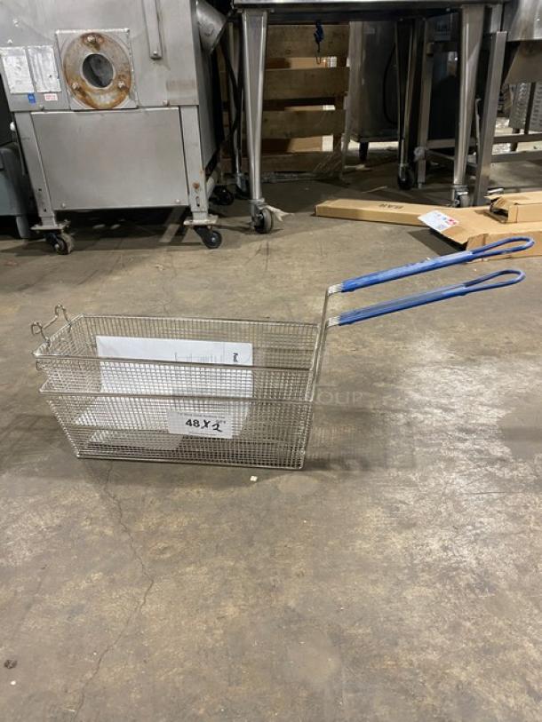 Brand new commercial wired mesh fry basket with front hook and blue non-slip grip handle. Tags visible, indicating dimensions.