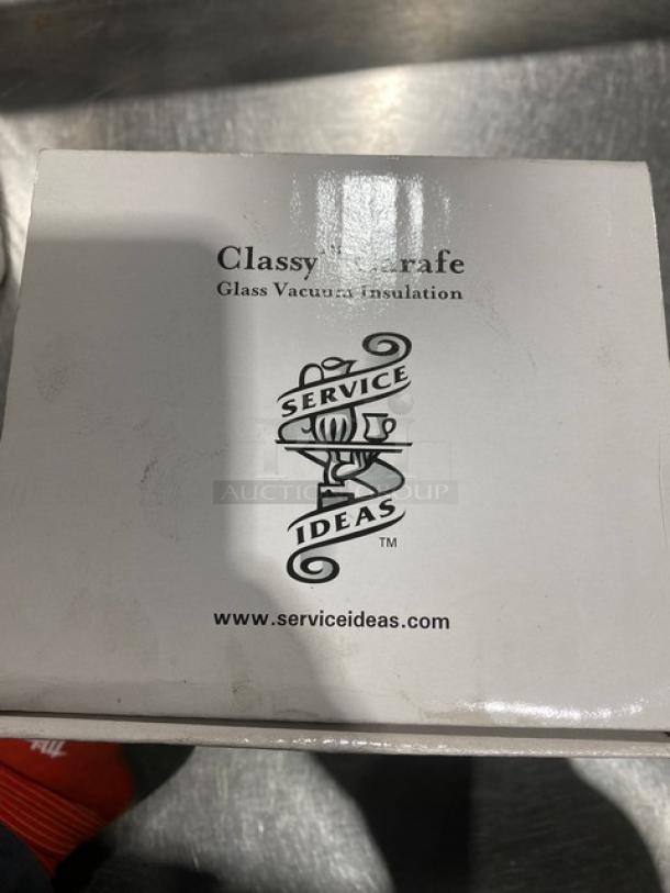 Service Ideas Classy Series coffee carafe, white powder-coated stainless steel, 33.8 oz, glass vacuum insulated, push-button lid, Model CJZ1WHT.