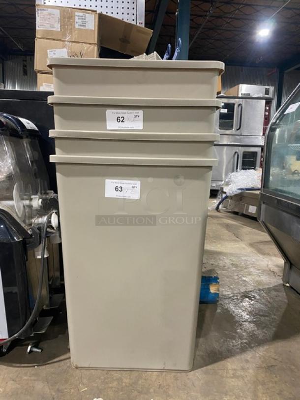 Rubbermaid Model 3958 beige 35-gal square trash can, new condition. Warehouse setting. Auction tags visible.