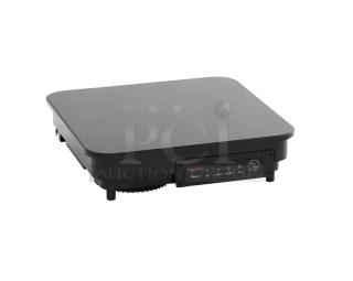 Brand new Spring USA SM-300CR induction warmer, black, countertop single burner, electric, 120V, control panel visible.