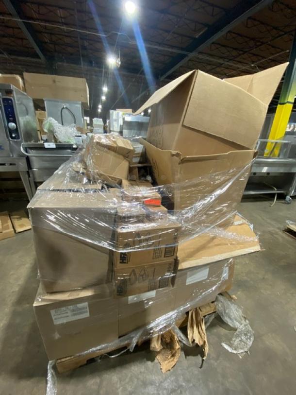 Mixed pallet of new commercial kitchen items wrapped in plastic, including Handi-Foil food containers, Cambro tongs, HFA containers with lids, Cambro spoons, LED light, disinfectant, and grease filters, all in original packaging.