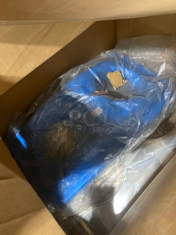 Mixed pallet including Handi-Foil, Cambro items, and more, packaged in a cardboard box with visible blue packaging inside.