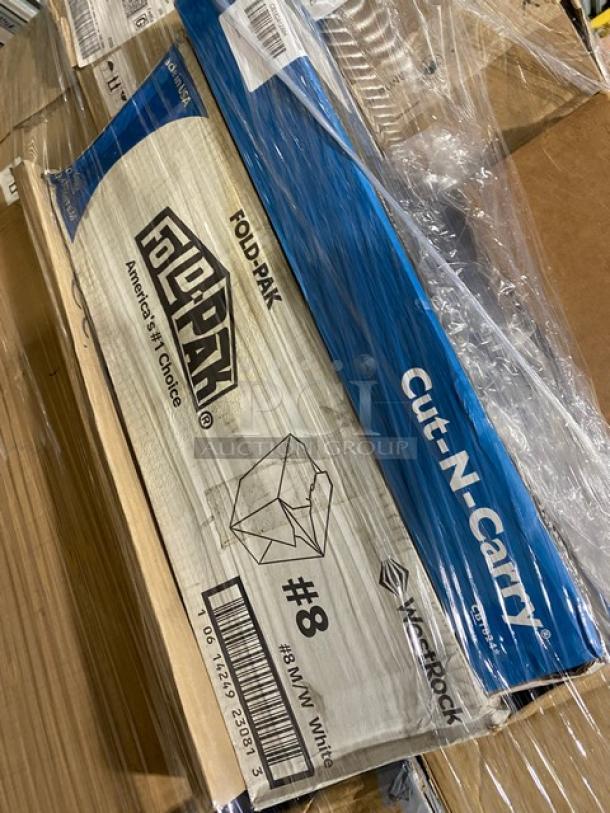 Mixed pallet containing Fold-Pak containers, San Jamar cutting board, and other commercial kitchen items. Boxes wrapped in plastic.