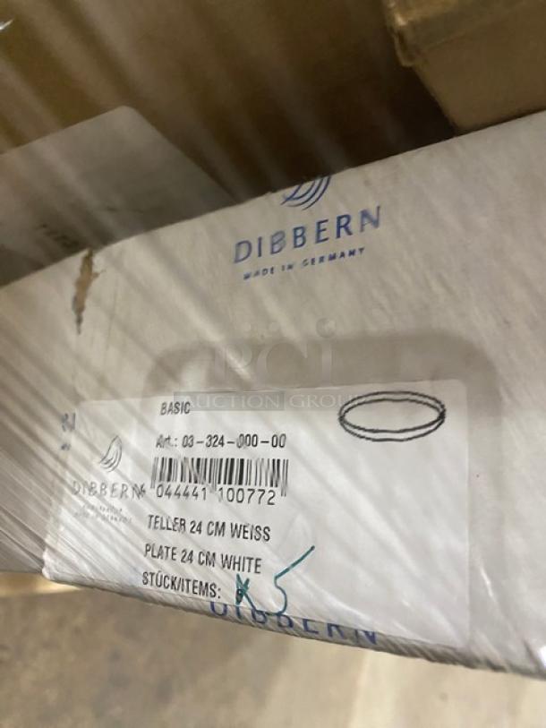 Mixed pallet auction item featuring a Dibbern 9.4" White Round Dessert Plate, Model 03-324-000-00, with original packaging.