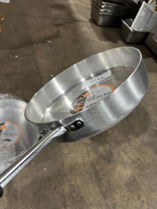 Vollrath Wear-Ever Commercial Aluminum 12" Sauté Pan, Model 67735, new, black riveted grip handle, 5 qt capacity.