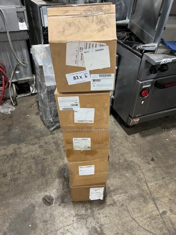 Stack of boxes containing Cal-Mil Model 3800-6-83 Ashwood Gray Oak Ice Housing/Beverage Display Unit, unopened and labeled.