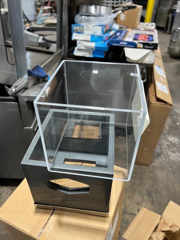 Brand new Cal-Mil Ashwood Gray Oak 7.5"x7.5"x7" ice housing, Model 3800-6-83, displayed on a cardboard box.