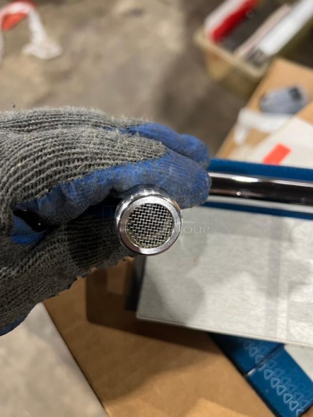 Brand new T&S 12" chrome plated swing nozzle, model 062XM. Features 3-3/4" clearance, perfect condition.