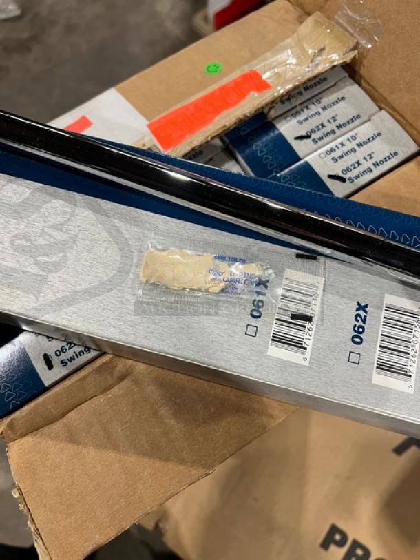 Brand new T&S 12" swing nozzle, chrome plated, model 062XM. Includes original packaging with labels and barcodes visible.