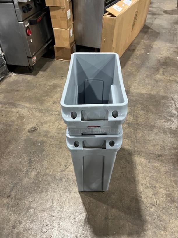 Brand new Rubbermaid Slim Jim gray 16-gallon rectangular waste bin, stackable, commercial-grade, with branding visible.