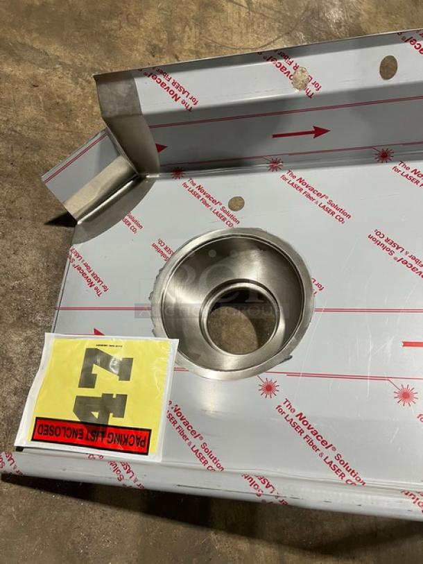 Advance Tabco stainless steel 5' dish table, model DTC-S70-60R/K-460, new with installation disposal cone, backsplash, and packaging label "47".