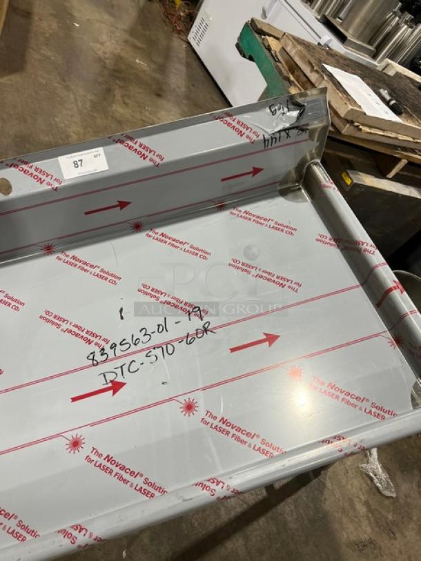 Brand new Advance Tabco stainless steel 5' dish table, model DTC-S70-60R/K-460, with disposal cone and backsplash.