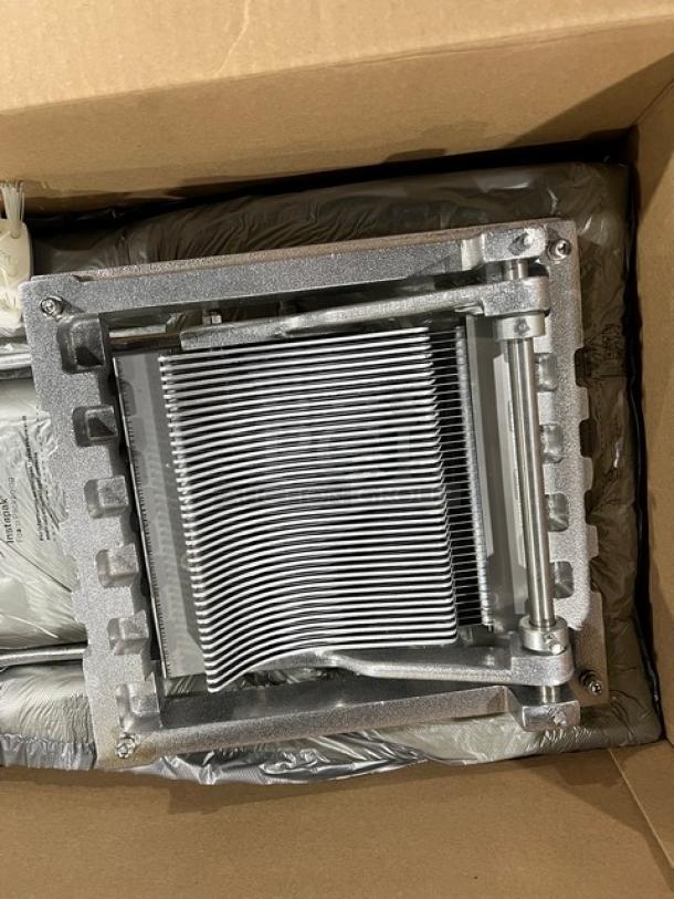 Brand new Vollrath Reco Series Model 400N vegetable shredder with 3/16" blades, ergonomic handle, and extra-wide base.