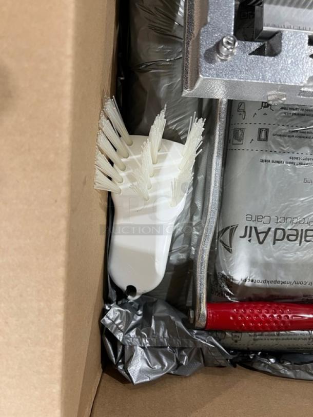 Brand new Vollrath Reco Series Vegetable Shredder, model 400N, with 3/16" blades and ergonomic handle, in box.