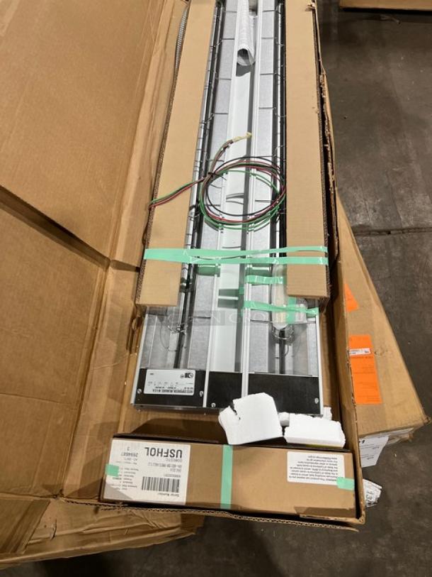 Brand new Hatco Glo-Ray GRA60D dual infrared warmer, 60", aluminum, 208V, in original packaging with tags visible.