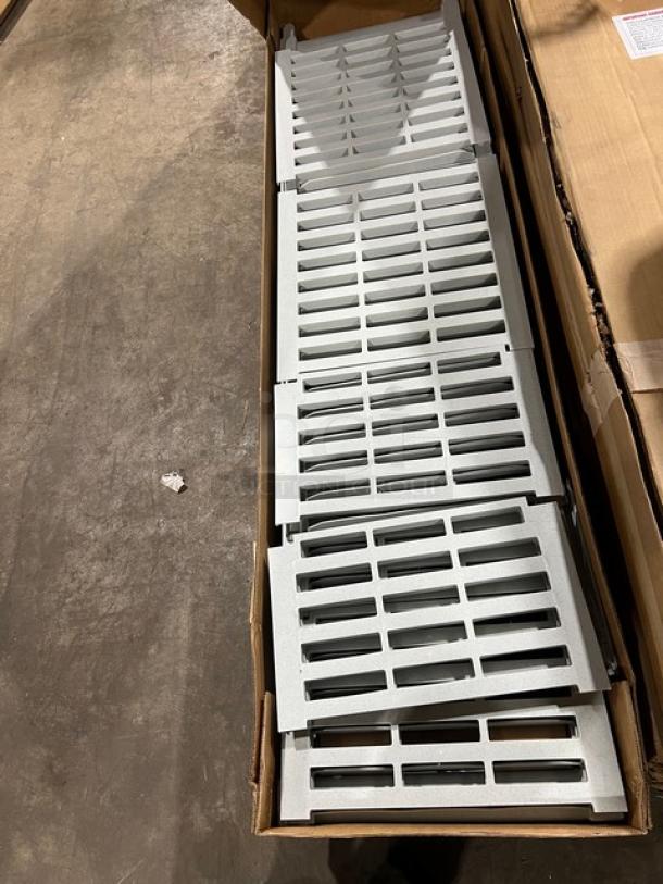 Brand new Cambro Camshelving Series 4-tier shelf kit, speckled gray, vented shelves, Model CPU186072V4480, in packaging.