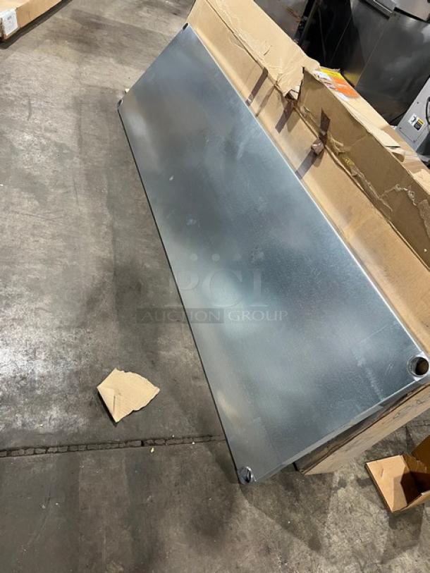 Brand new Advance Tabco UG-30-96 undershelf, 18 gauge galvanized steel, 30"x96", adjustable worktable, in original packaging.