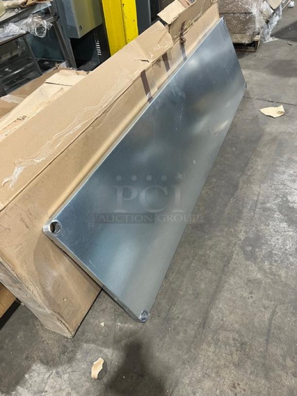 Brand new Advance Tabco UG3096 30"x96" worktable undershelf in 18-gauge galvanized steel, still in packaging.