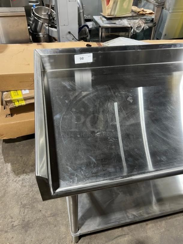 Advance Tabco stainless steel prep table with right-side sink, undershelf, and splashguards. Brand new condition.