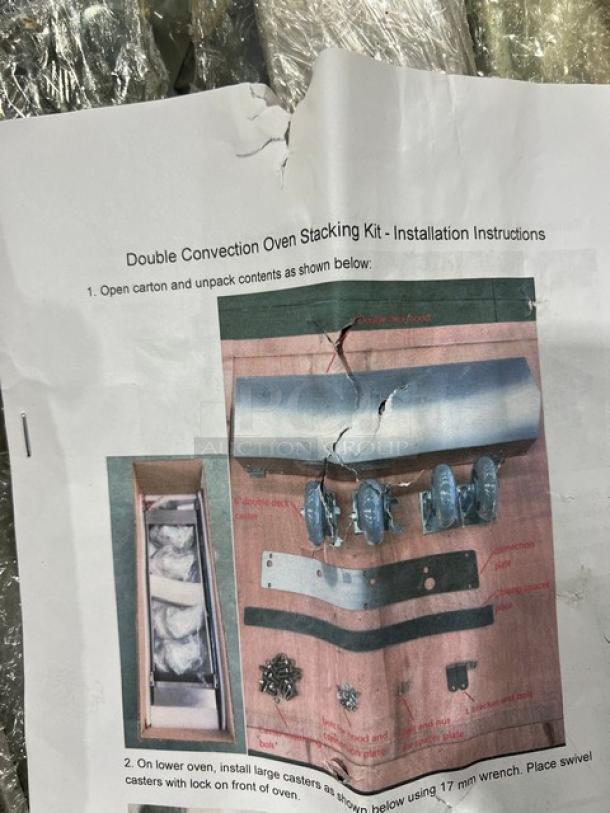 Brand new commercial double convection oven stacking kit with casters, includes instruction manual, hardware shown on page.