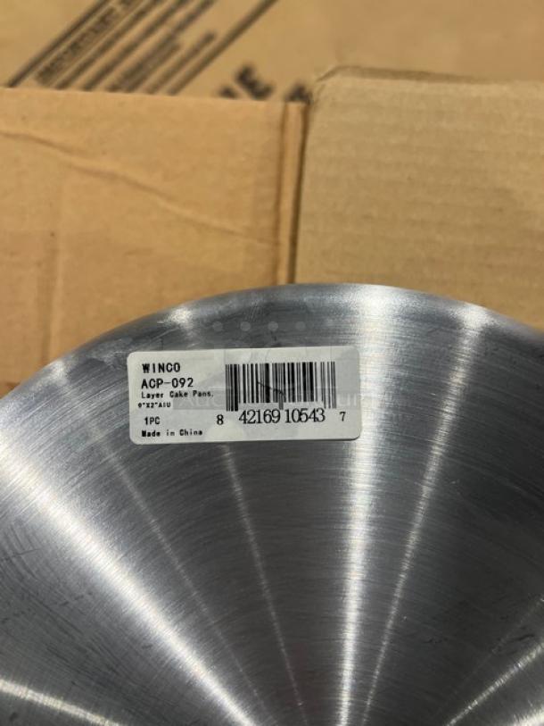 BRAND NEW Winco ACP-092, 9" Round 2" Deep Aluminum Cake Pan. Barcode label visible, made in China.