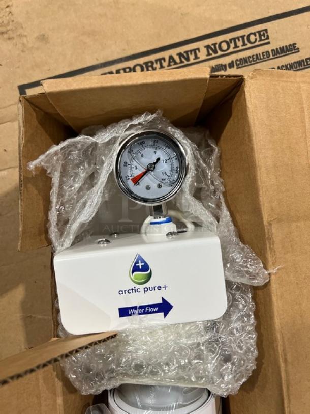 Brand new Manitowoc Arctic Pure Plus AR10000P commercial ice machine water filtration system in box with gauge and labels.