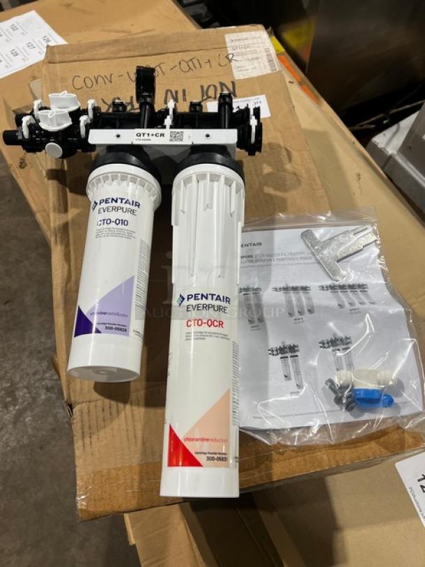 Brand new Pentair Everpure QT1+CR commercial water filtration system with chloramine reduction. Includes manuals and fittings.