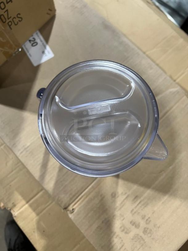 Brand new G.E.T. Enterprises 64 oz. clear textured pitcher with lid, model P-3064-1-CL, top view.