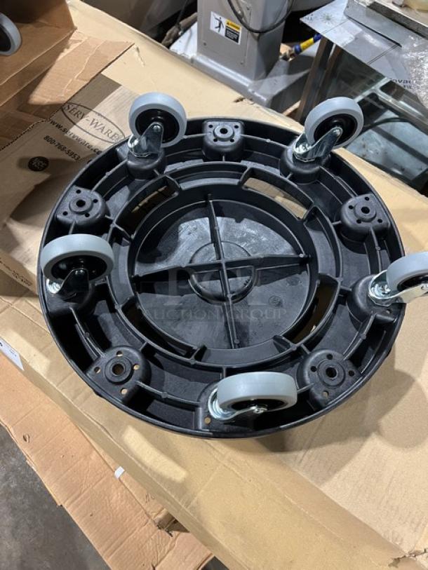 Brand new Carlisle Bronco Series commercial trash can dolly, model 36910, in black, features six caster wheels.