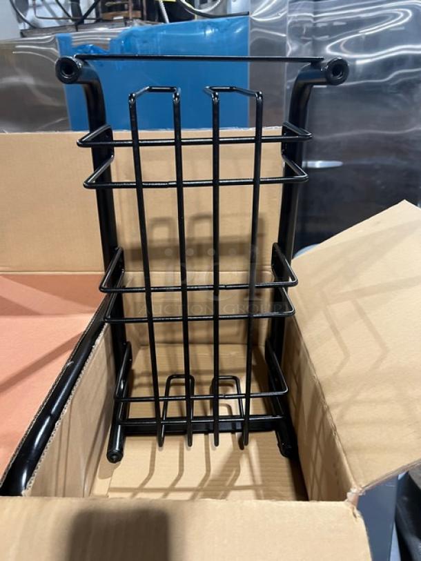 Brand new Continental Model 8320 Wall Hugger Dolly with casters, black, 150 lb capacity, shown in open box.