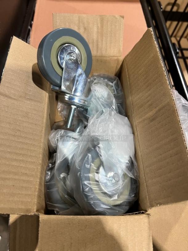 Brand new Continental Model 8320 Wall Hugger Dolly with casters in box. 150 lb capacity, black.