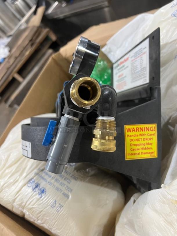 Brand new Vulcan SMF620-SYSTEM ScaleBlocker water filtration system with connectors, warning label, and original packaging.