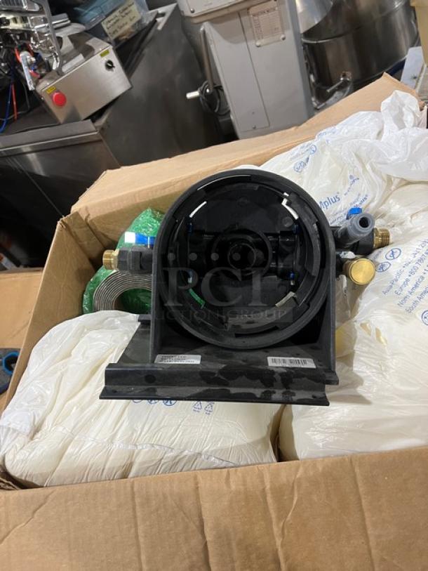 Brand new Vulcan SMF620SYSTEM ScaleBlocker water filtration system in box, showing main unit and fittings.