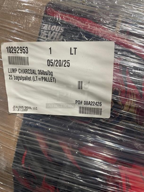 A full pallet of Jealous Devil Commercial All-Natural Hardwood Lump Charcoal, 35 lbs per bag, 25 bags per pallet, new condition.